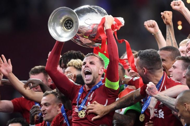 Liverpool fans celebrate at final whistle